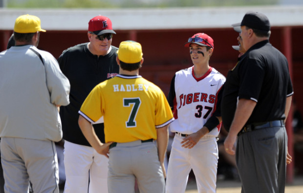 Elsinore%27s+Head+Coach+Chris+Jones+and+Blaine+Kline+%28%2337%29+meet+Mira+Costa+Coach+Cassidy+Olson+and+Jack+Hadley+%28%237%29+with+the+Umpires+before+the+CIF+Division+3+semifinal+game+at+Elsinore+High+School+in+Wildomar+on+Tuesday+May+28%2C2013.+MILKA+SOKO