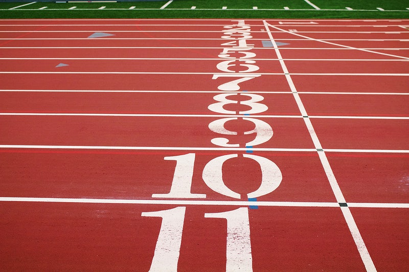 Numbers+along+the+starting+line+on+a+running+track.+Original+public+domain+image+from+Wikimedia+Commons