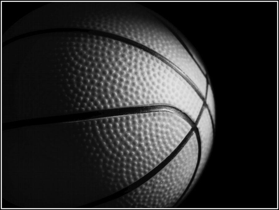 Closeup on basketball in black and white. Free public domain CC0 photo.